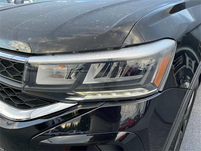 used 2024 Volkswagen Taos car, priced at $20,296