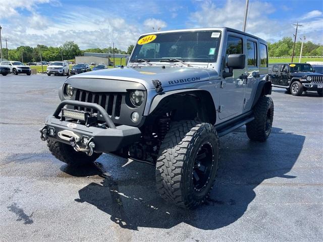 used 2014 Jeep Wrangler Unlimited car, priced at $17,830