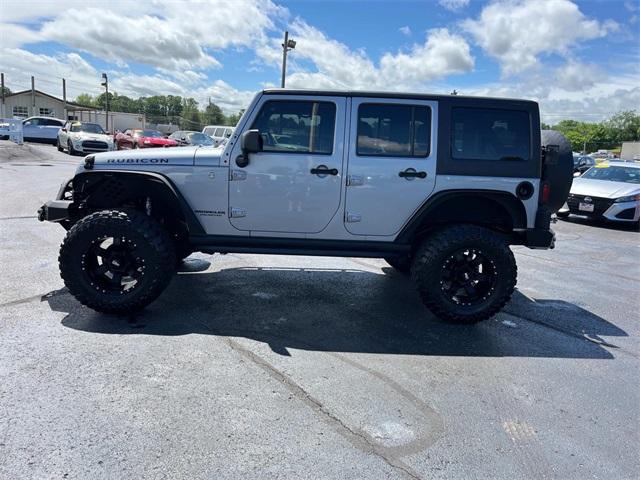 used 2014 Jeep Wrangler Unlimited car, priced at $17,830