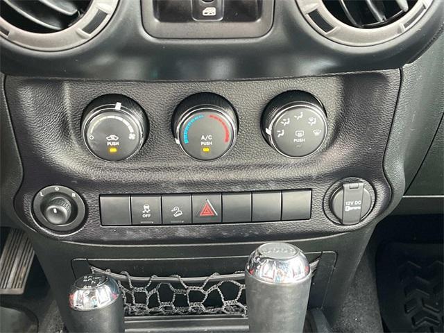 used 2015 Jeep Wrangler Unlimited car, priced at $19,125