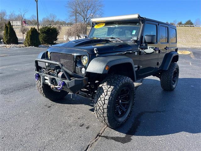 used 2015 Jeep Wrangler Unlimited car, priced at $18,072