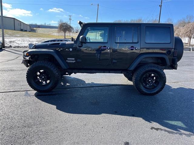 used 2015 Jeep Wrangler Unlimited car, priced at $18,072