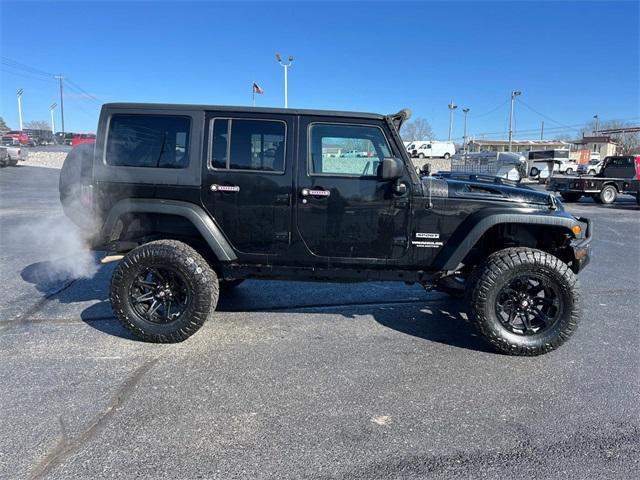 used 2015 Jeep Wrangler Unlimited car, priced at $18,072