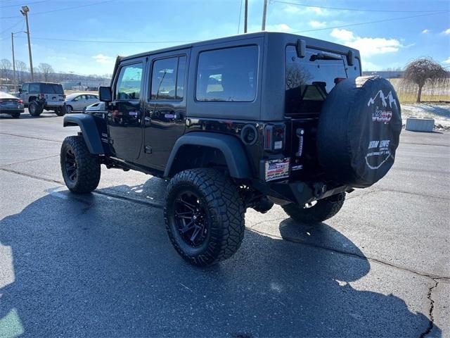 used 2015 Jeep Wrangler Unlimited car, priced at $18,072