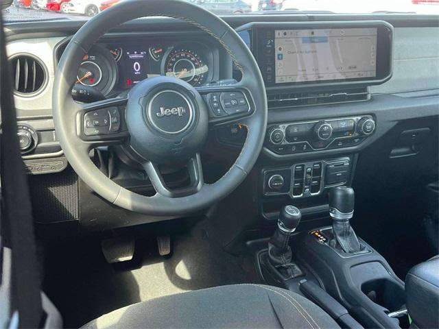 used 2024 Jeep Wrangler car, priced at $35,627