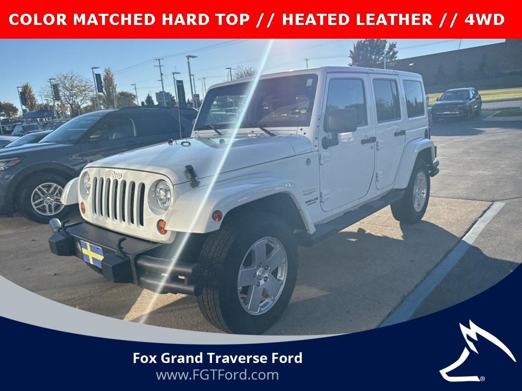 used 2011 Jeep Wrangler Unlimited car, priced at $14,900