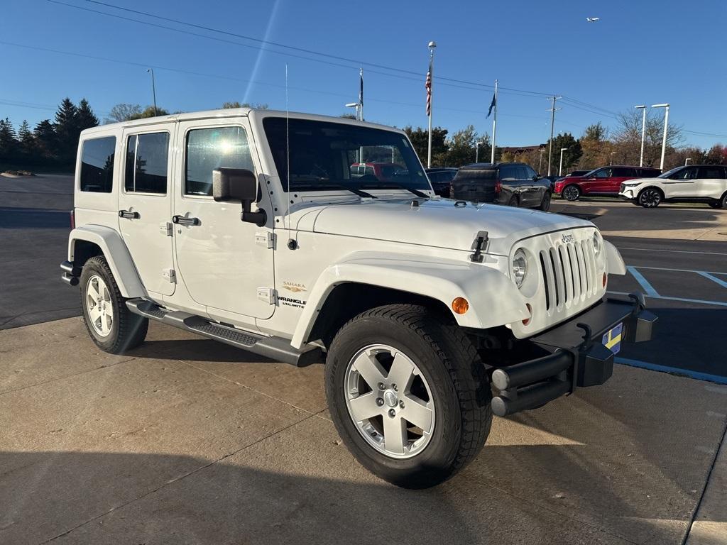 used 2011 Jeep Wrangler Unlimited car, priced at $14,900