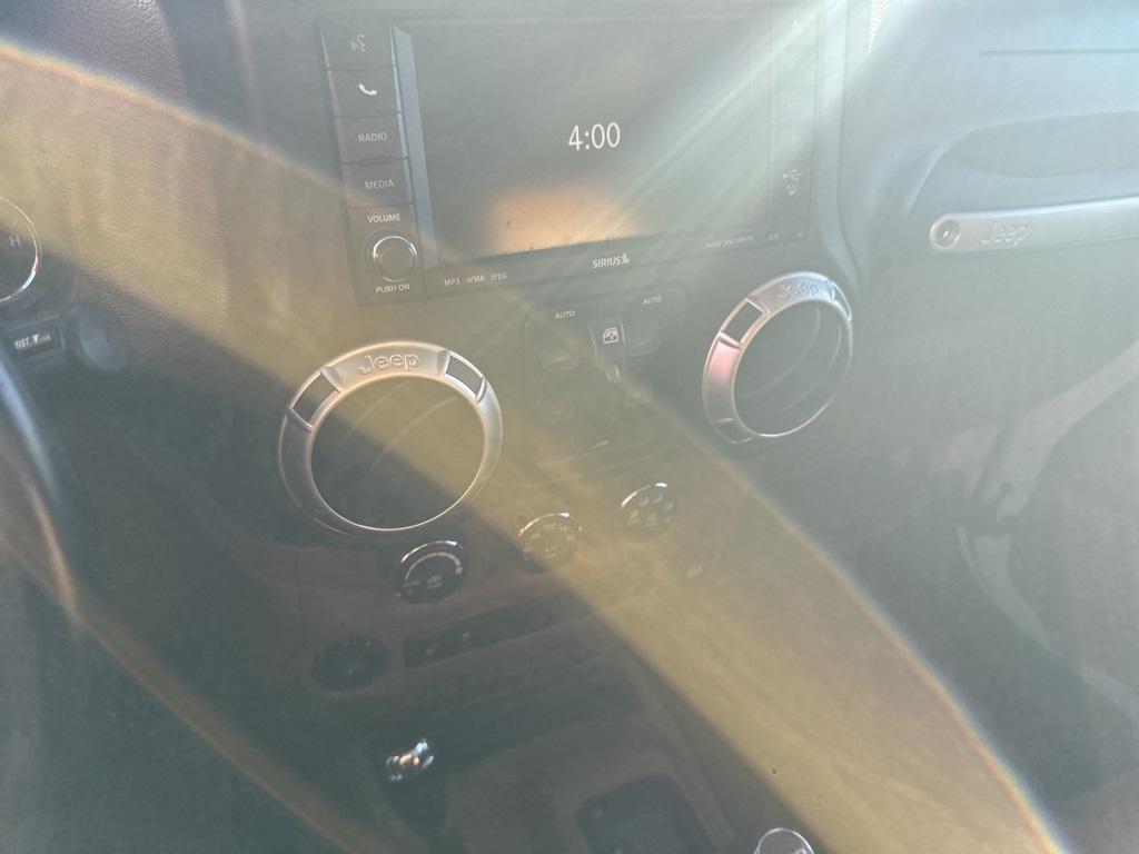 used 2011 Jeep Wrangler Unlimited car, priced at $14,900