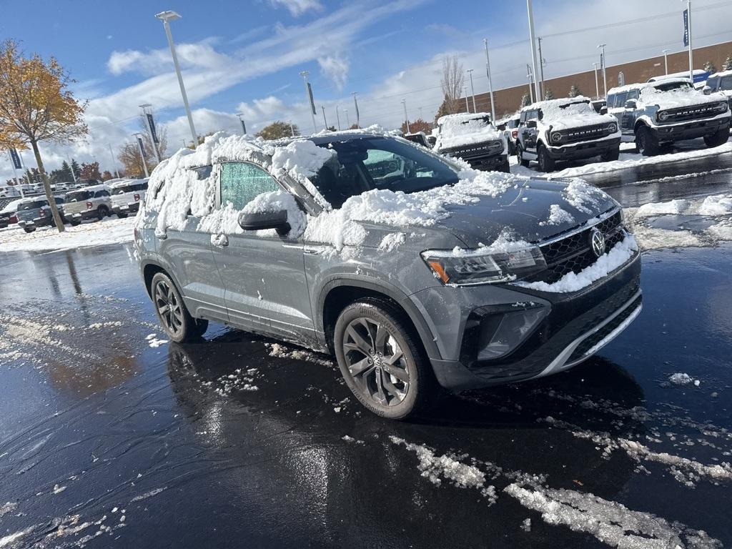 used 2023 Volkswagen Taos car, priced at $23,198