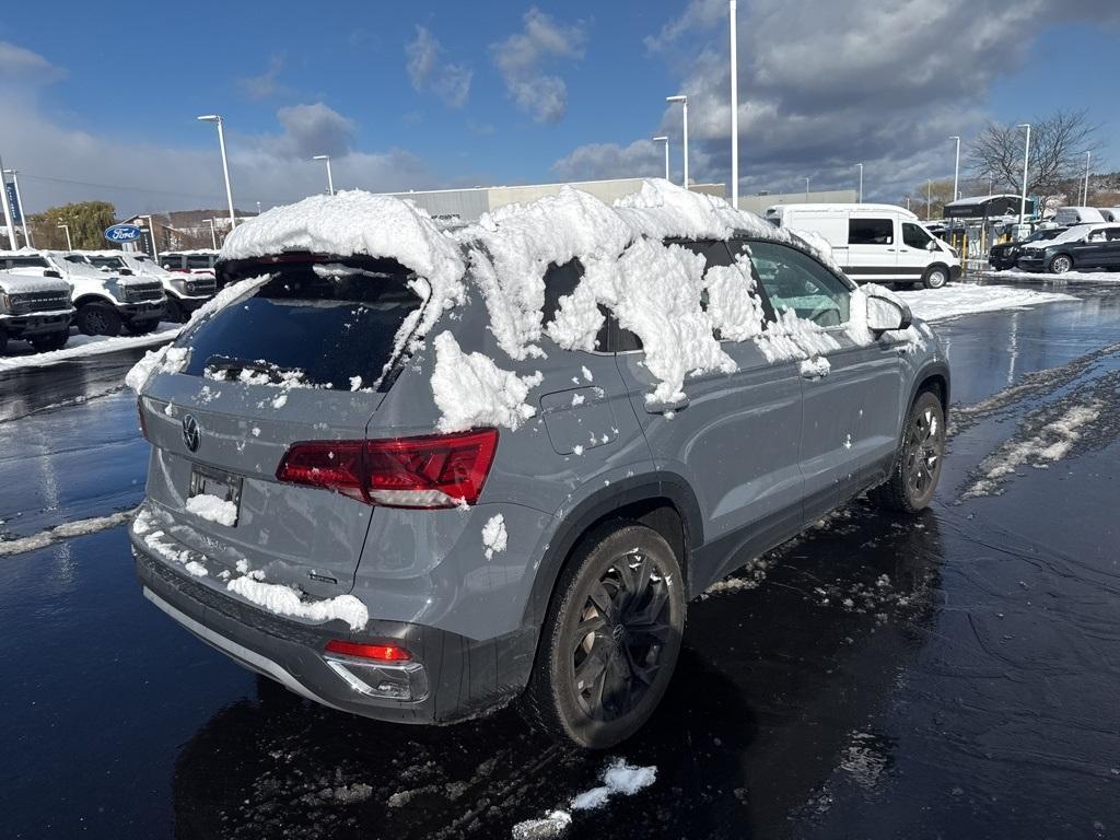 used 2023 Volkswagen Taos car, priced at $23,198