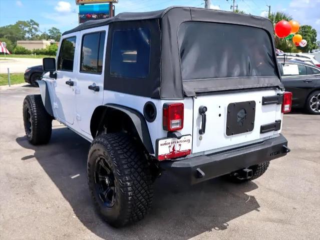 used 2016 Jeep Wrangler Unlimited car, priced at $18,880