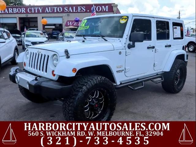used 2012 Jeep Wrangler Unlimited car, priced at $19,880