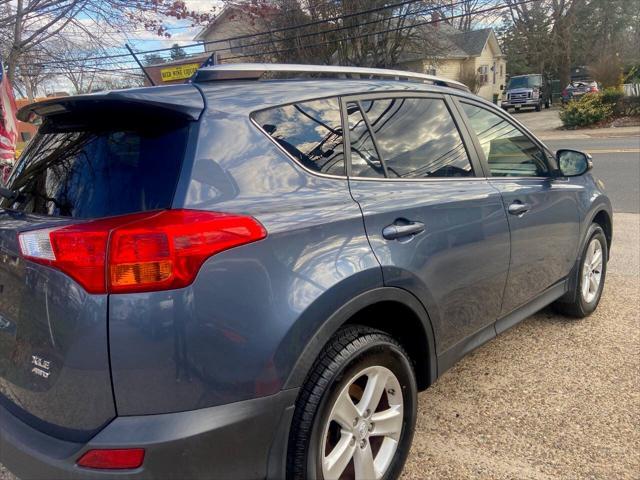 used 2013 Toyota RAV4 car, priced at $10,499