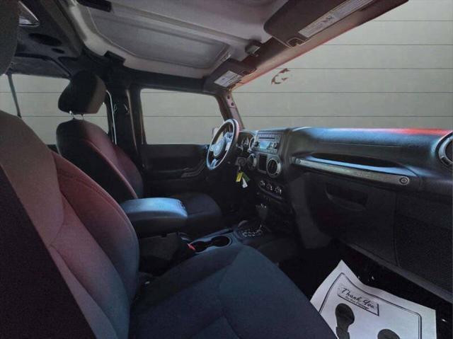 used 2015 Jeep Wrangler Unlimited car, priced at $13,999