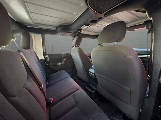 used 2015 Jeep Wrangler Unlimited car, priced at $13,999