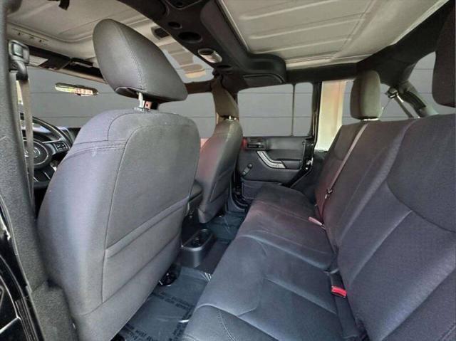 used 2015 Jeep Wrangler Unlimited car, priced at $13,999