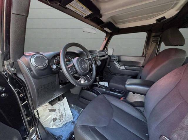 used 2015 Jeep Wrangler Unlimited car, priced at $13,999
