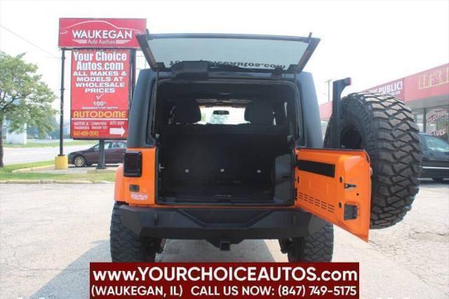 used 2012 Jeep Wrangler Unlimited car, priced at $16,499
