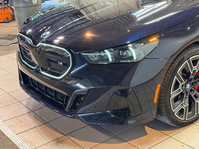 used 2024 BMW i5 car, priced at $64,580