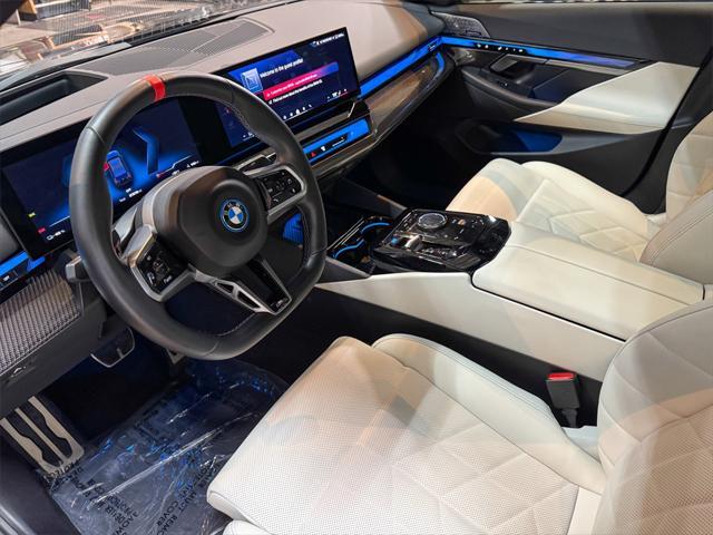used 2024 BMW i5 car, priced at $64,580