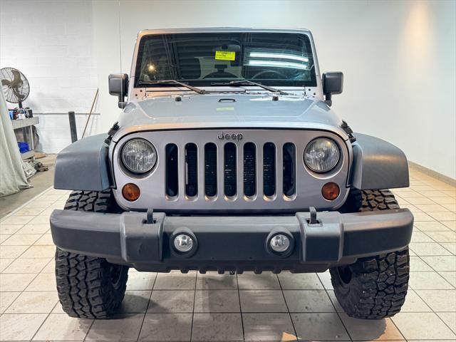 used 2013 Jeep Wrangler Unlimited car, priced at $16,872