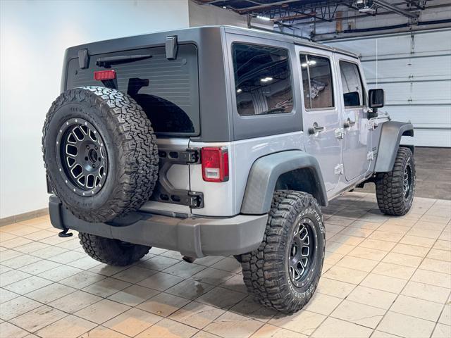 used 2013 Jeep Wrangler Unlimited car, priced at $16,872