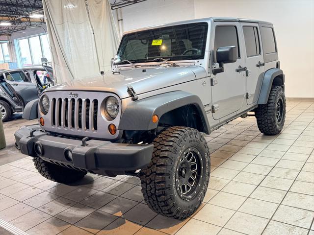 used 2013 Jeep Wrangler Unlimited car, priced at $16,872