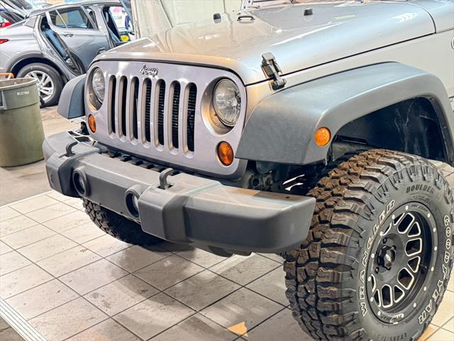 used 2013 Jeep Wrangler Unlimited car, priced at $16,872