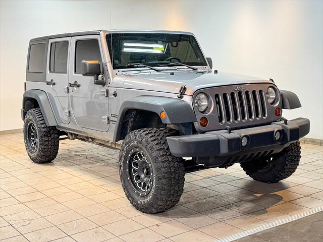 used 2013 Jeep Wrangler Unlimited car, priced at $16,872