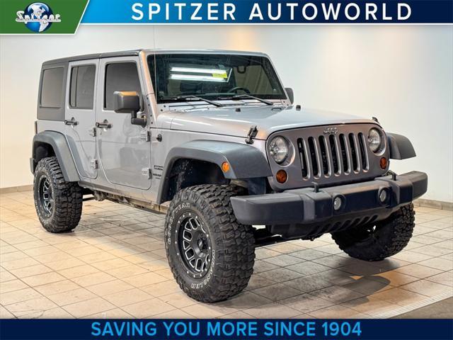 used 2013 Jeep Wrangler Unlimited car, priced at $17,655