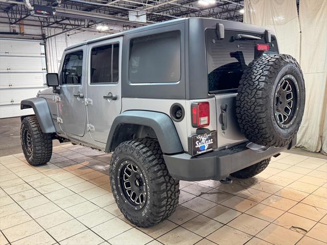 used 2013 Jeep Wrangler Unlimited car, priced at $16,872