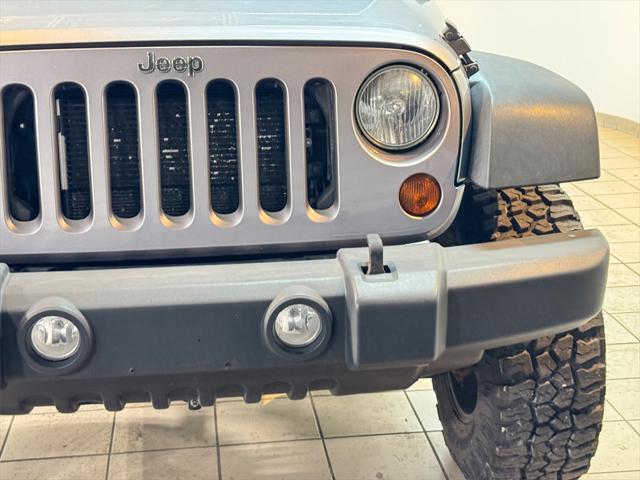 used 2013 Jeep Wrangler Unlimited car, priced at $16,872