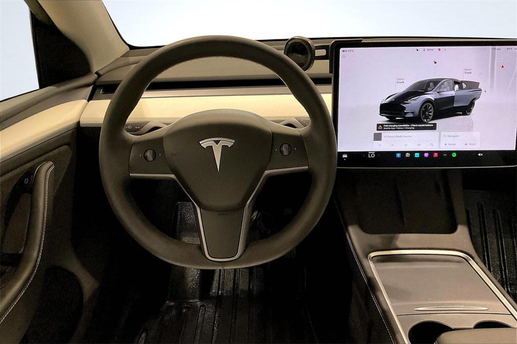 used 2023 Tesla Model Y car, priced at $30,900