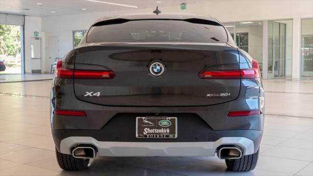 used 2024 BMW X4 car, priced at $46,900