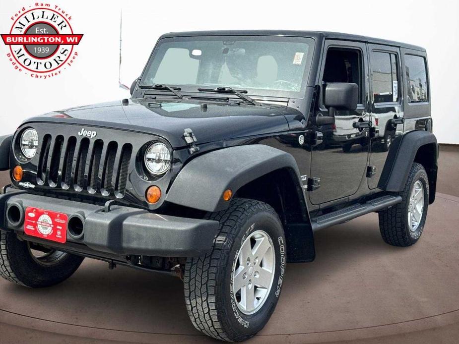 used 2011 Jeep Wrangler Unlimited car, priced at $18,995