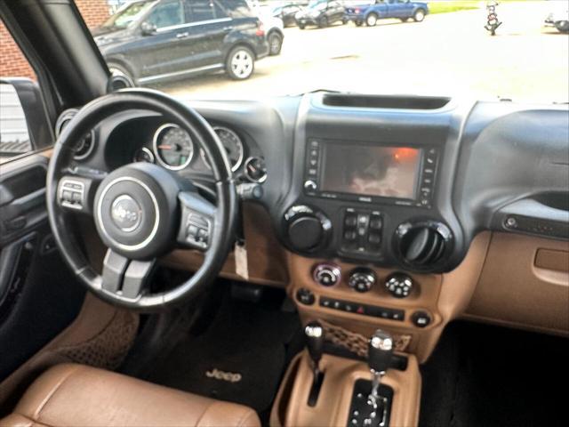 used 2012 Jeep Wrangler Unlimited car, priced at $16,488