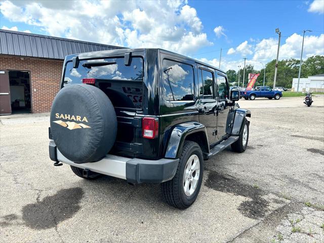 used 2012 Jeep Wrangler Unlimited car, priced at $16,488