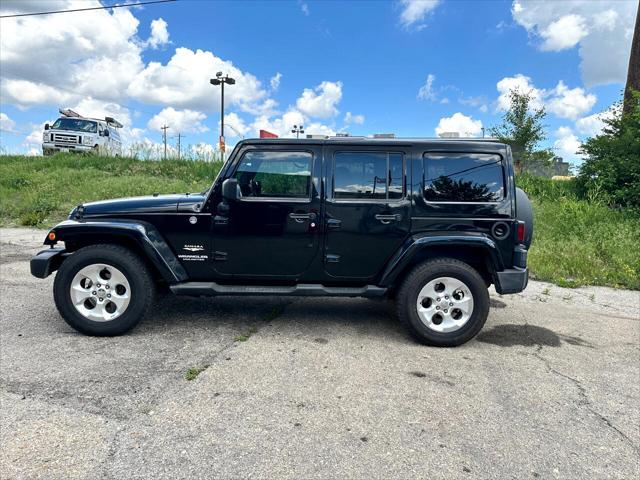 used 2012 Jeep Wrangler Unlimited car, priced at $16,488