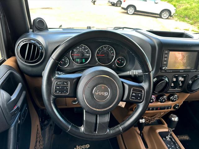 used 2012 Jeep Wrangler Unlimited car, priced at $16,488