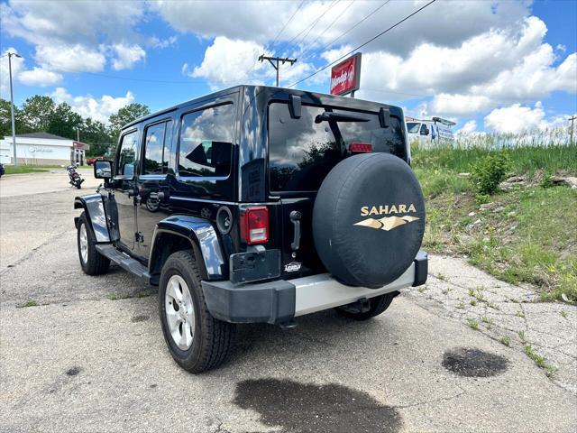 used 2012 Jeep Wrangler Unlimited car, priced at $16,488