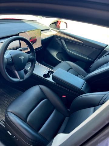 used 2023 Tesla Model Y car, priced at $34,995