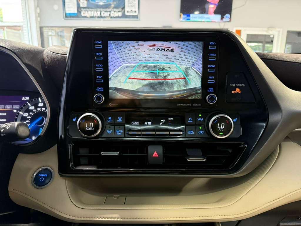 used 2021 Toyota Highlander Hybrid car, priced at $33,995