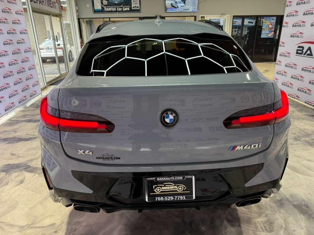 used 2024 BMW X4 car, priced at $55,995