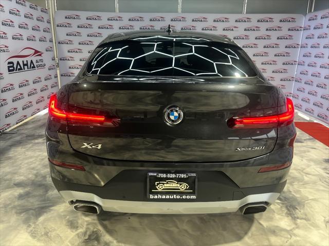 used 2023 BMW X4 car, priced at $42,995