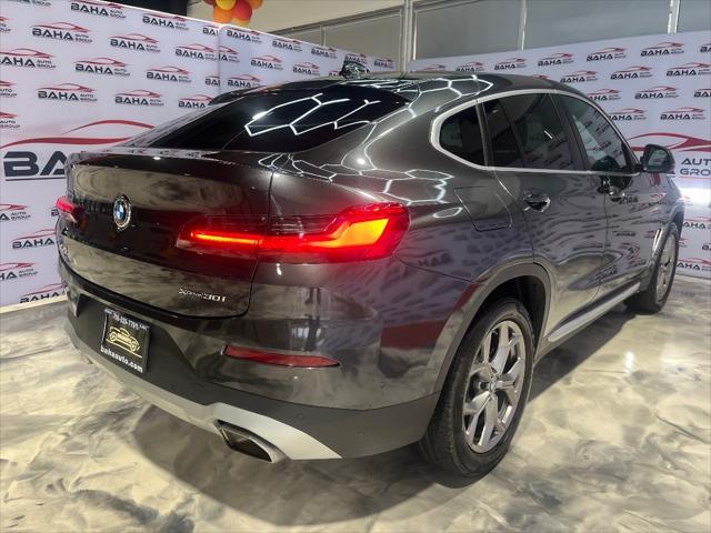 used 2023 BMW X4 car, priced at $42,995