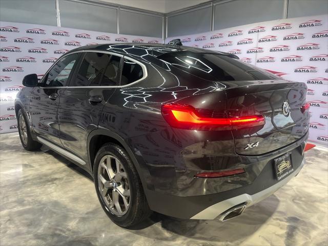 used 2023 BMW X4 car, priced at $42,995