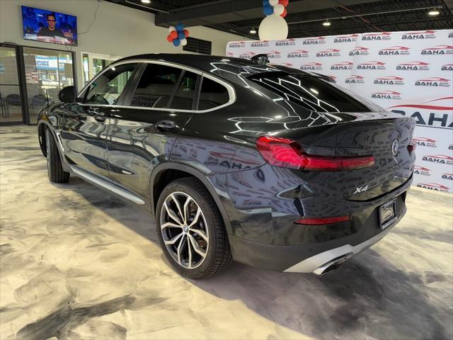 used 2022 BMW X4 car, priced at $36,995