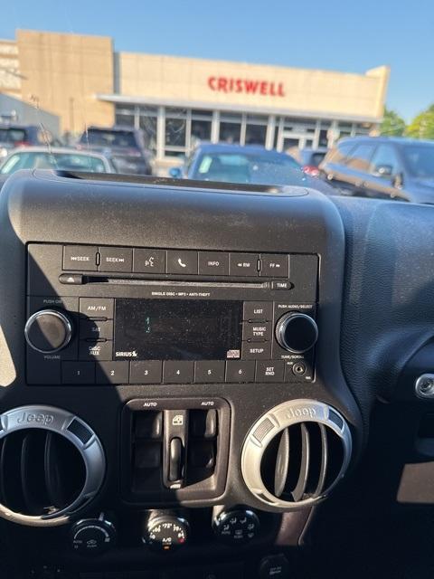 used 2016 Jeep Wrangler Unlimited car, priced at $19,610