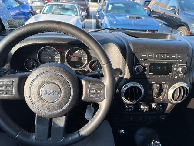 used 2016 Jeep Wrangler Unlimited car, priced at $19,610