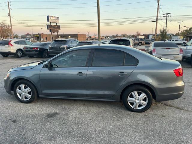 used 2014 Volkswagen Passat car, priced at $7,899